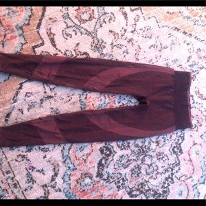 Pink leggings. color: maroon